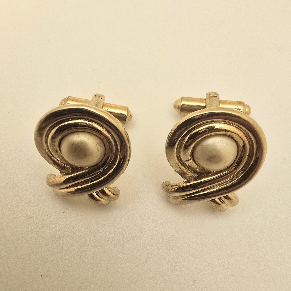 Elegant Gold Cufflinks With Pearl Accent.
